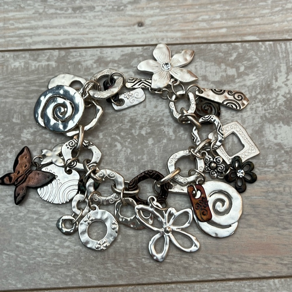 Funky Boho Chunky Bracelet with 15 Fun Charms. 7 1/2” long. Bar/loop closure